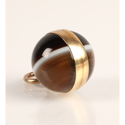 78 - Victorian agate spherical locket pendant with yellow metal mounts