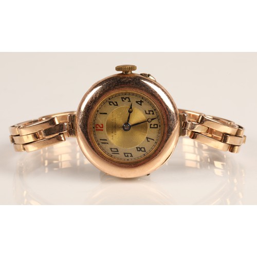 83A - Ladies 9ct gold wrist watch on a 9ct gold expandable strap, gross weight 25g