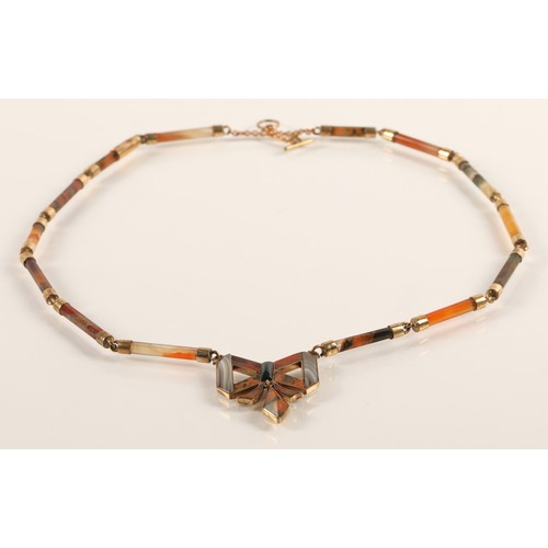 56 - Ladies agate necklace mounted in unmarked yellow metal, 39cm long