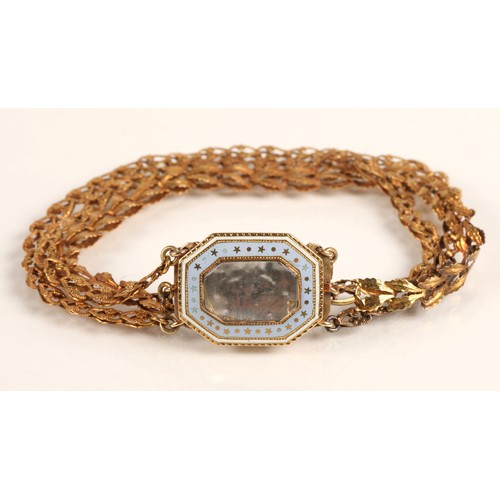 57 - Ladies three strand yellow metal bracelet with enamelled mourning clasp, 10.2g