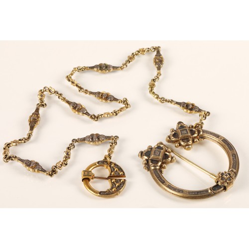 58 - Pennanular yellow metal brooch and chain, chain length 46cm