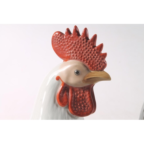 13 - Pair of Chinese pottery cockerel models, 30cm high.