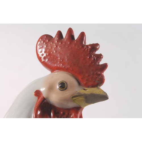 13 - Pair of Chinese pottery cockerel models, 30cm high.