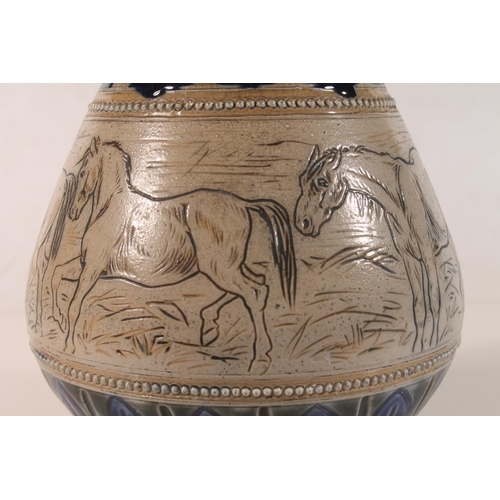 15 - Doulton Lambeth stoneware jug decorated with horses by Florence Barlow, the base stamped FEB, 24cm h... 