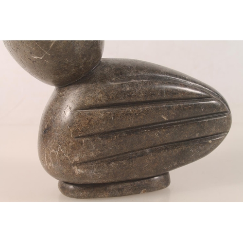 21 - Zimbabwean carved serpentine model of a bird signed to base FAINZNA, 18cm high.