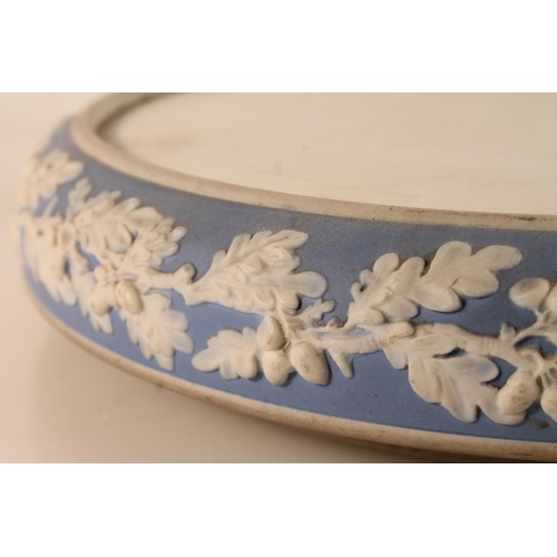 24 - Wedgwood style jasperware blue and white cheese dome on stand decorated with classical scenes, 28cm ... 