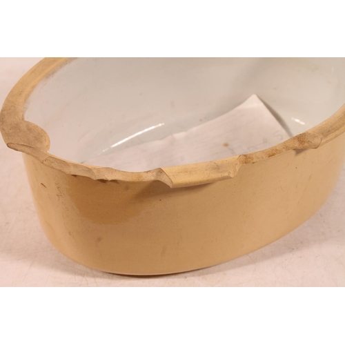 32 - Antique pottery game tureen with insert, 26cm long.