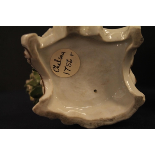 33 - Pair of porcelain figures modelled as man with grapes and lady with flowers, Chelsea style gold anch... 