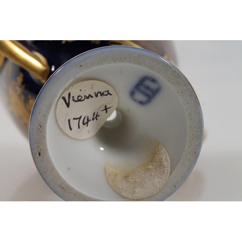 36 - Vienna porcelain jug, a Vienna porcelain trophy with hand-painted vignettes of horses and riders, be... 