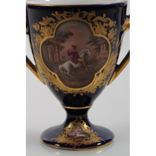 36 - Vienna porcelain jug, a Vienna porcelain trophy with hand-painted vignettes of horses and riders, be... 