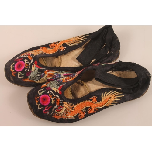 41 - Pair of Chinese embroidered needlework silk slippers, 24cm long.