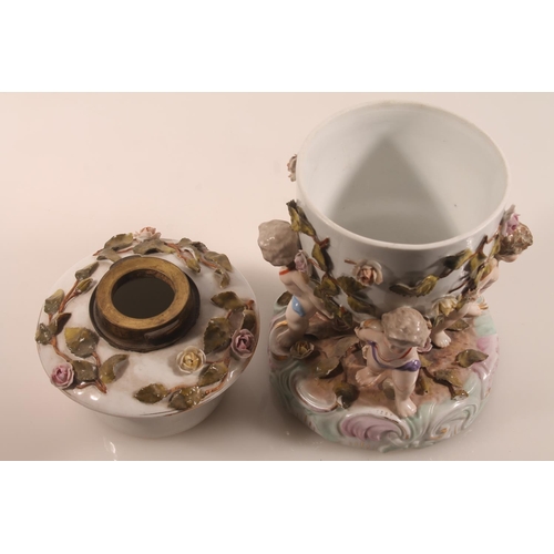 42 - Antique Meissen style lamp base with four cherub supports and relief floral decoration, blue crossed... 