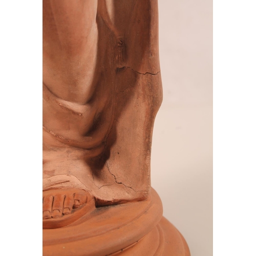 43 - Watcombe of Torquay terracotta statue modelled as a pensive woman, stamped to base, 40cm high.