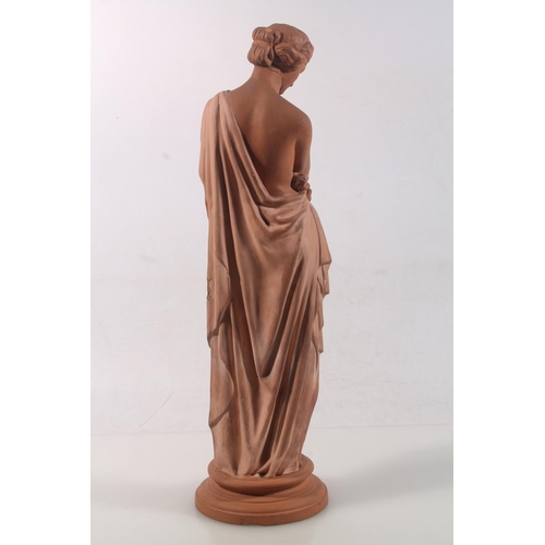 43 - Watcombe of Torquay terracotta statue modelled as a pensive woman, stamped to base, 40cm high.