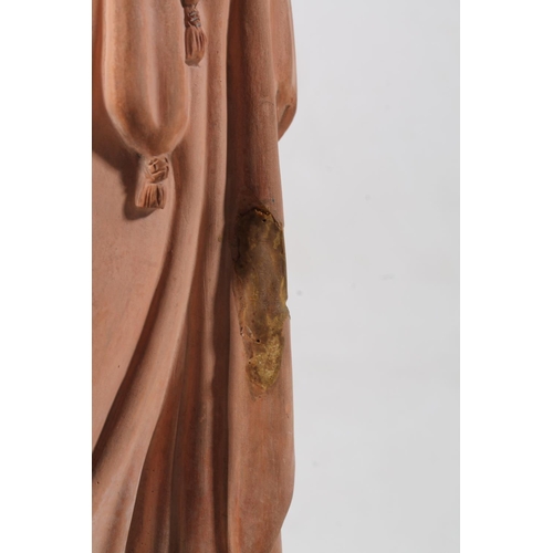 43 - Watcombe of Torquay terracotta statue modelled as a pensive woman, stamped to base, 40cm high.