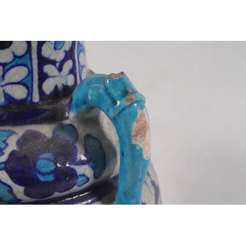 50 - Iznik style terracotta blue and white painted baluster urn converted to a table lamp.