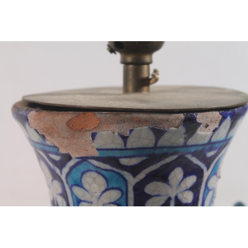 50 - Iznik style terracotta blue and white painted baluster urn converted to a table lamp.