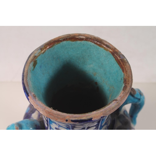 50 - Iznik style terracotta blue and white painted baluster urn converted to a table lamp.