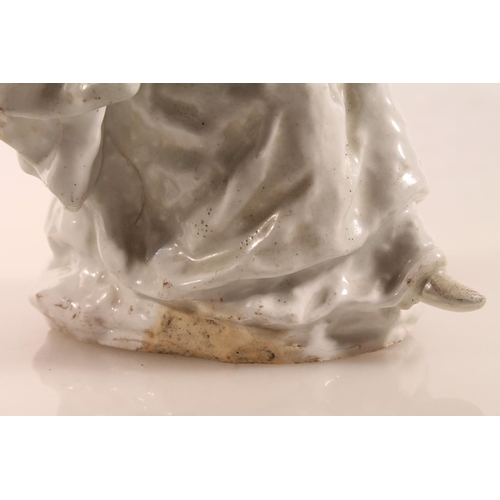 55 - Bow circa 1750/1760 blanc-de-chine porcelain figure of a nun reading a book, 15.5cm high.