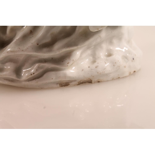 55 - Bow circa 1750/1760 blanc-de-chine porcelain figure of a nun reading a book, 15.5cm high.