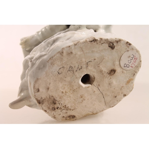 55 - Bow circa 1750/1760 blanc-de-chine porcelain figure of a nun reading a book, 15.5cm high.