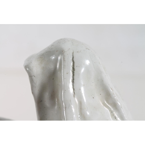 55 - Bow circa 1750/1760 blanc-de-chine porcelain figure of a nun reading a book, 15.5cm high.