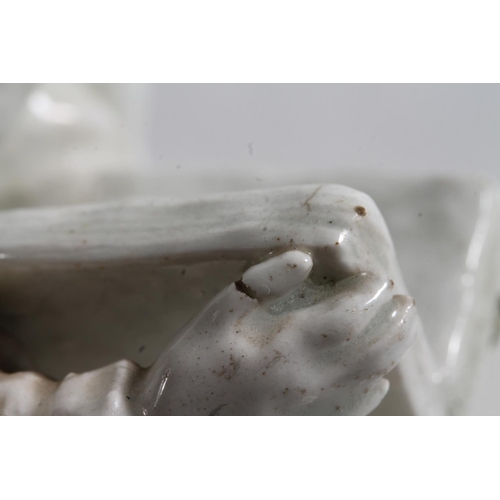 55 - Bow circa 1750/1760 blanc-de-chine porcelain figure of a nun reading a book, 15.5cm high.