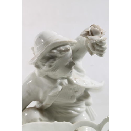 56 - Antique porcelain basket modelled with figure clutching flower support, Meissen style blue crossed s... 