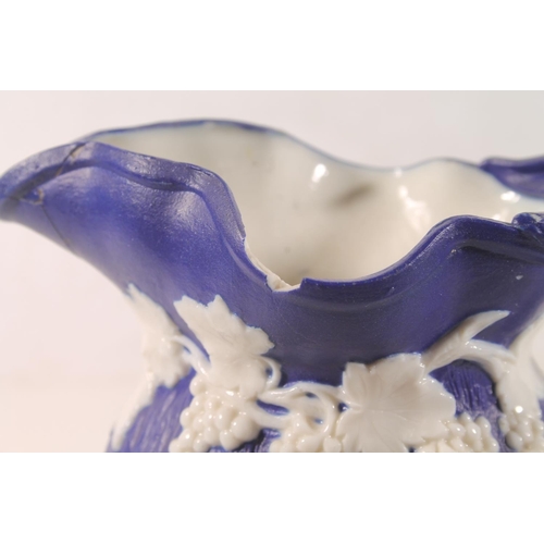 7 - Samuel Alcock & Co. Naomi and her Daughters-in-law pink and white relief decorated jug., 20cm hi... 