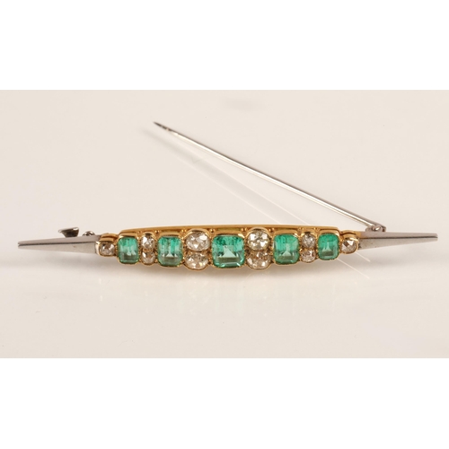 55 - Good ladies 18ct two tone gold emerald and diamond bar brooch, five emeralds interspersed with gradu... 