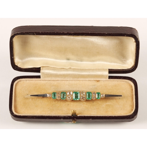 55 - Good ladies 18ct two tone gold emerald and diamond bar brooch, five emeralds interspersed with gradu... 