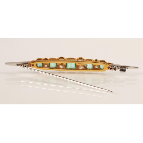 55 - Good ladies 18ct two tone gold emerald and diamond bar brooch, five emeralds interspersed with gradu... 