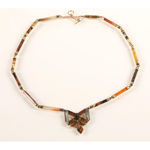 56 - Ladies agate necklace mounted in unmarked yellow metal, 39cm long