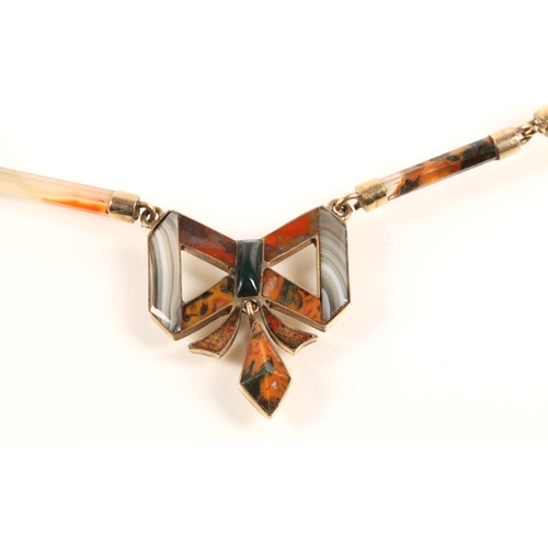 56 - Ladies agate necklace mounted in unmarked yellow metal, 39cm long