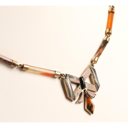 56 - Ladies agate necklace mounted in unmarked yellow metal, 39cm long