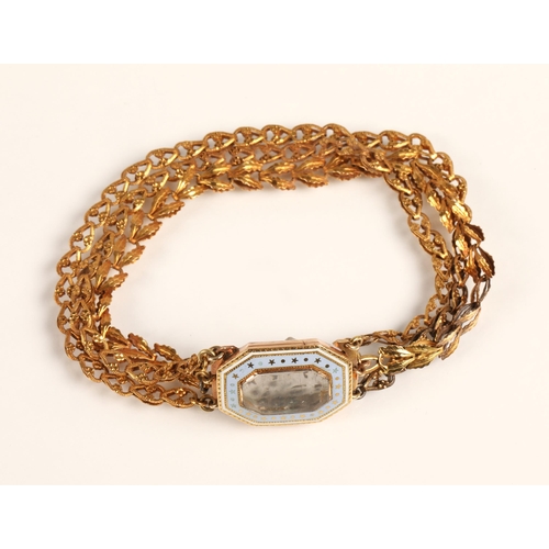 57 - Ladies three strand yellow metal bracelet with enamelled mourning clasp, 10.2g