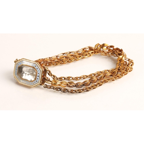 57 - Ladies three strand yellow metal bracelet with enamelled mourning clasp, 10.2g