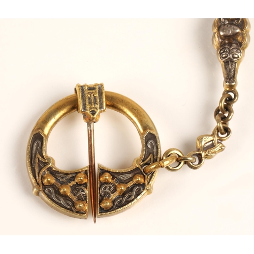 58 - Pennanular yellow metal brooch and chain, chain length 46cm