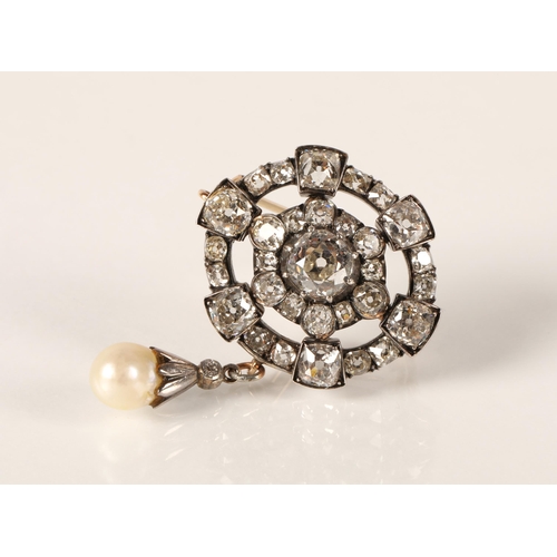 61 - Impressive diamond encrusted brooch, central 1.5 carat stone surrounded by six 0.20 stone interspers... 