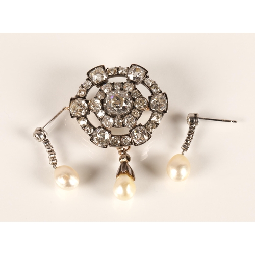 61 - Impressive diamond encrusted brooch, central 1.5 carat stone surrounded by six 0.20 stone interspers... 