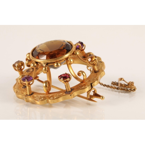 74 - Victorian gold circular brooch set with central cairngorm stone surrounded by six smaller gemstones,... 