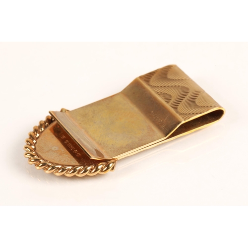 74A - 9ct yellow gold money clip with engine turned decoration, weight 13.6g