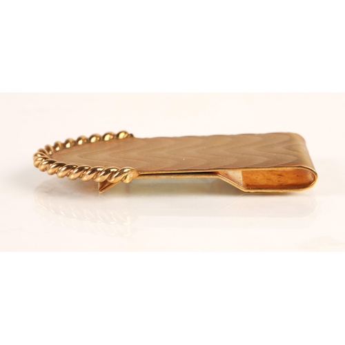 74A - 9ct yellow gold money clip with engine turned decoration, weight 13.6g