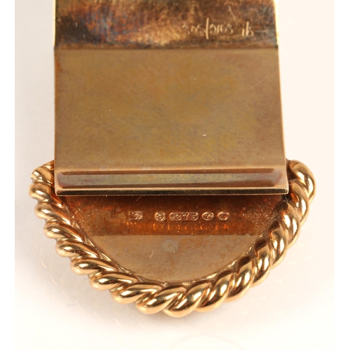 74A - 9ct yellow gold money clip with engine turned decoration, weight 13.6g
