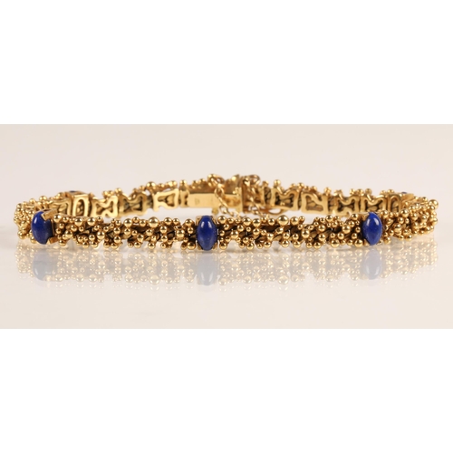 77 - Ladies 18ct yellow gold bracelet set with six lapis lazuli beads, gross weight 29.6g, approx. length... 