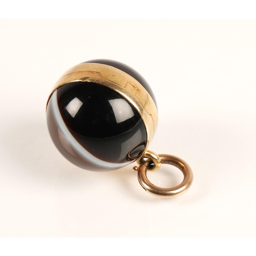 78 - Victorian agate spherical locket pendant with yellow metal mounts