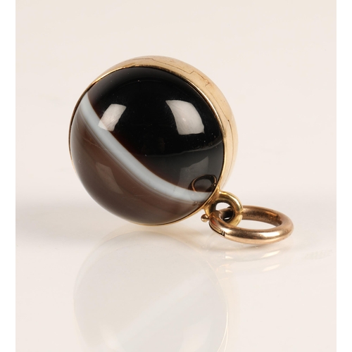 78 - Victorian agate spherical locket pendant with yellow metal mounts