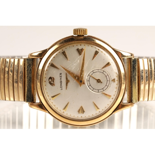 82 - Gents 9ct yellow gold Longines wrist watch, champagne dial with hour marker batons and subsidiary di... 
