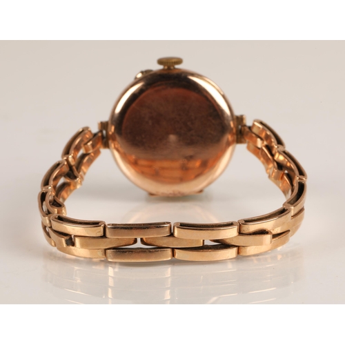 83A - Ladies 9ct gold wrist watch on a 9ct gold expandable strap, gross weight 25g