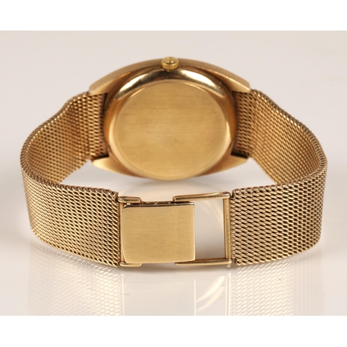 84 - 9ct gold Omega automatic wrist watch, champagne dial with baton hour markers and date aperture, on a... 